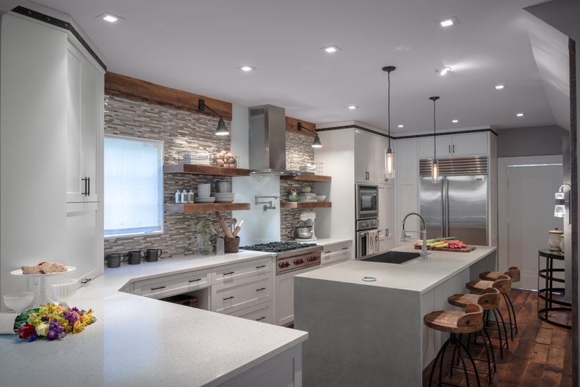 white Caesarstone countertops over white cabinets with stainless appliances | Marchand Creative Kitchens Cabinets New Orleans Metairie Mandeville LA