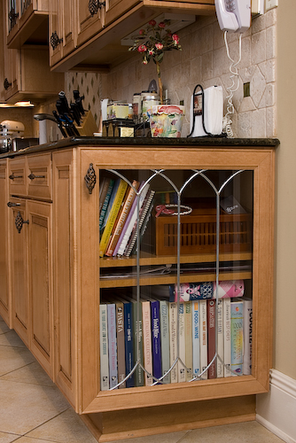 cookbook end cabinet with leaded glass door | Marchand Creative Kitchens Cabinets, Marchand Creative Kitchens, Cabinets, New Orleans, Metairie, Mandeville, Kenner, Covington, Slidell, Lacombe, North Shore, South Shore, Kitchen, kitchen remodel, kitchen renovation