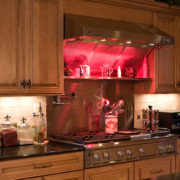 custom range area lighting over range | Marchand Creative Kitchens Cabinets New Orleans Metairie Mandeville LA