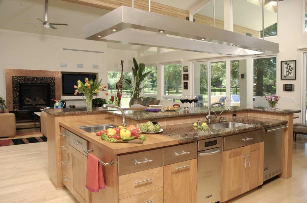 specialty task lighting over work spaces in light wood kitchen with stainless appliances and top drawer fronts | Marchand Creative Kitchens Cabinets New Orleans Metairie Mandeville LA