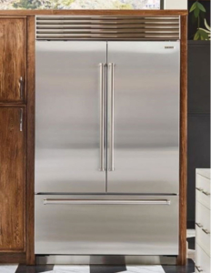 Stainelss steel refrigerator in kitchen | Marchand Creative Kitchens