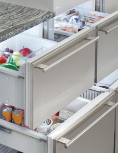 Undercounter refrigeraed drawers with food inside | Marchand Creative Kitchens
